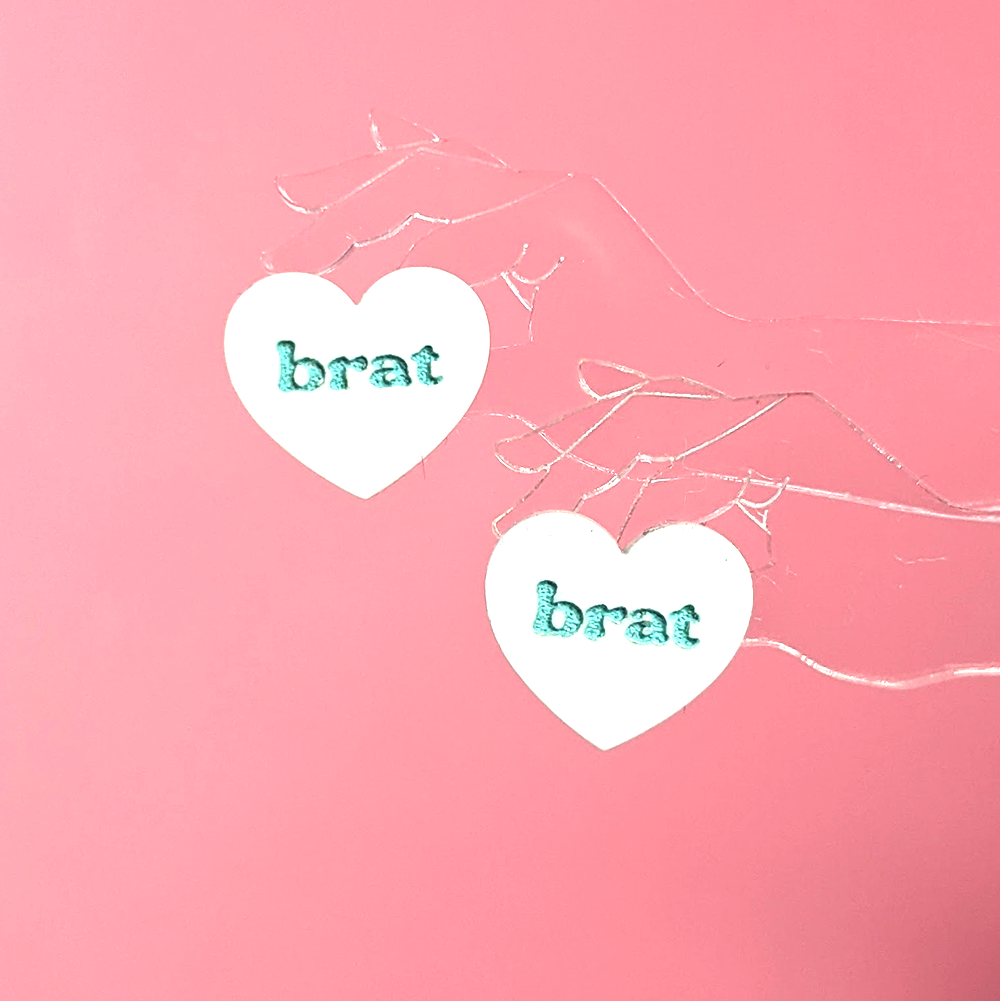 Bimbo Confrontation Heart Earrings