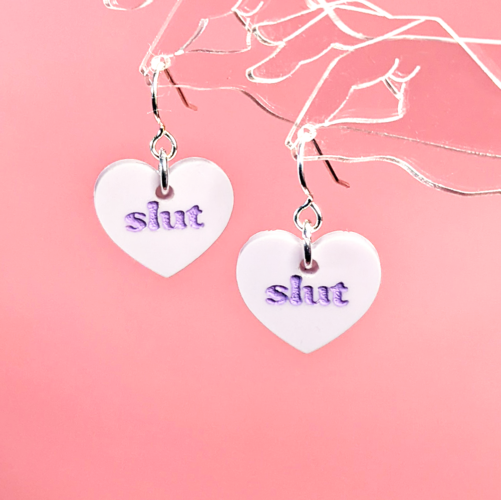 Bimbo Confrontation Heart Earrings